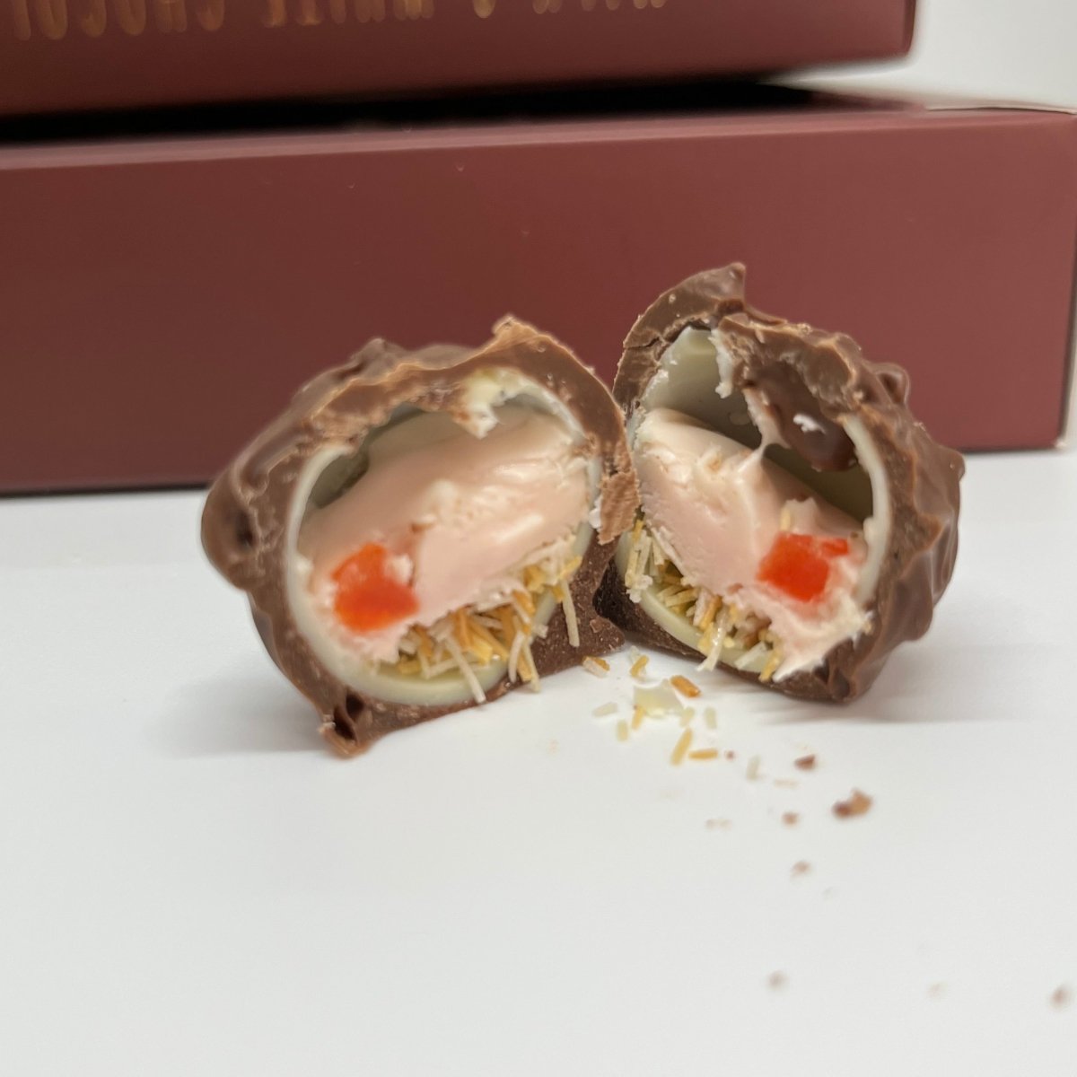 Ema Chocolate Milk and White Chocolate Truffles with Strawberry Filled - Merry Christmas Box - 250g - TryAladdin