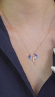 Taki | Hugging Couple Zilveren Ketting met Blauwe Steen Michael Engel Vleugels